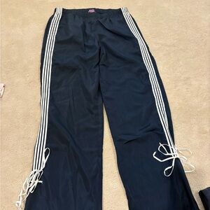 Edikted track pants with bottom ties.  Navy with white stripes. Never worn!